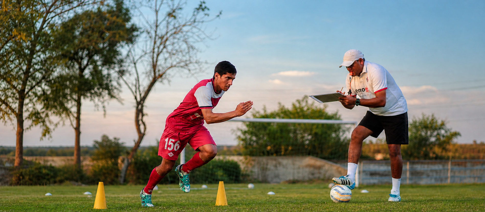 BBFS coach assessing a player during a structured acceleration drill