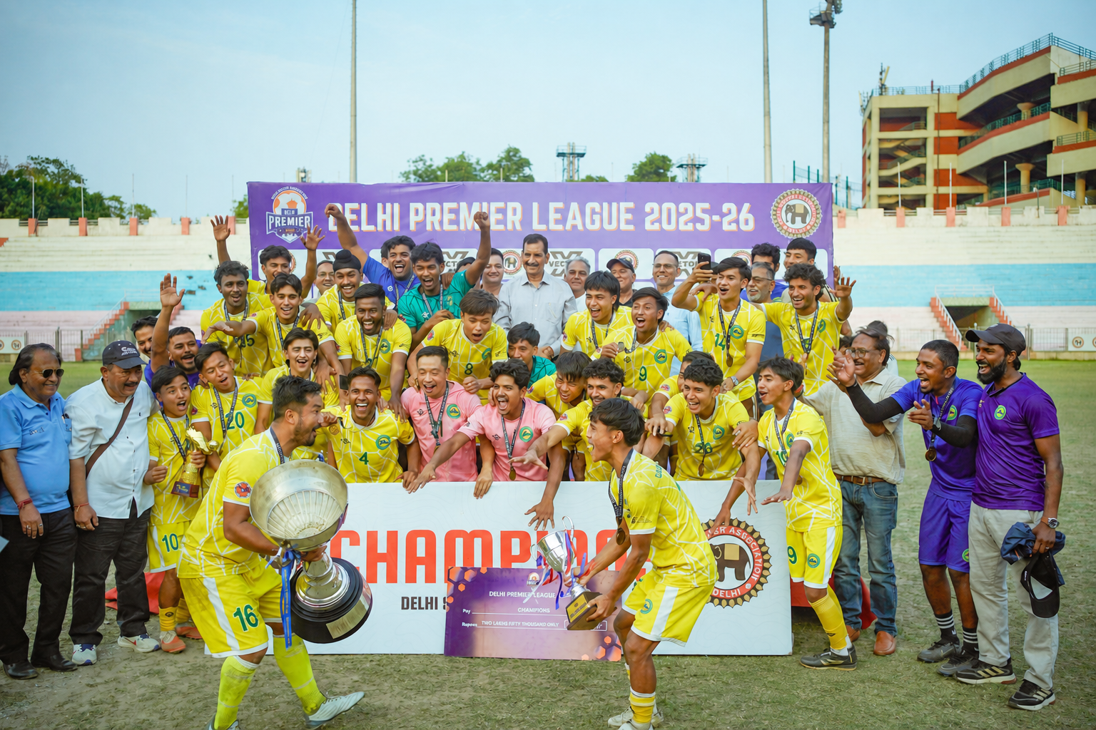 Garhwal Heroes FC celebrating the Delhi Premier League 2025–26 title with the championship trophy